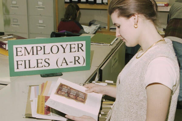 Co-op student looking at employer files