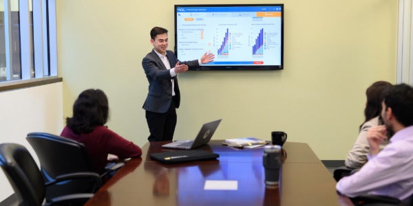 A student in the Environment and Business program gives a presentation.
