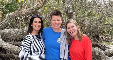 Roulla Essa, Heather Pritchard and Judy Kruger standing in front of a tree