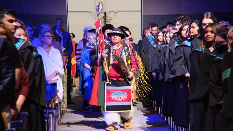 Indigenous staff and students with Myeengun Henry at the convocation ceremony