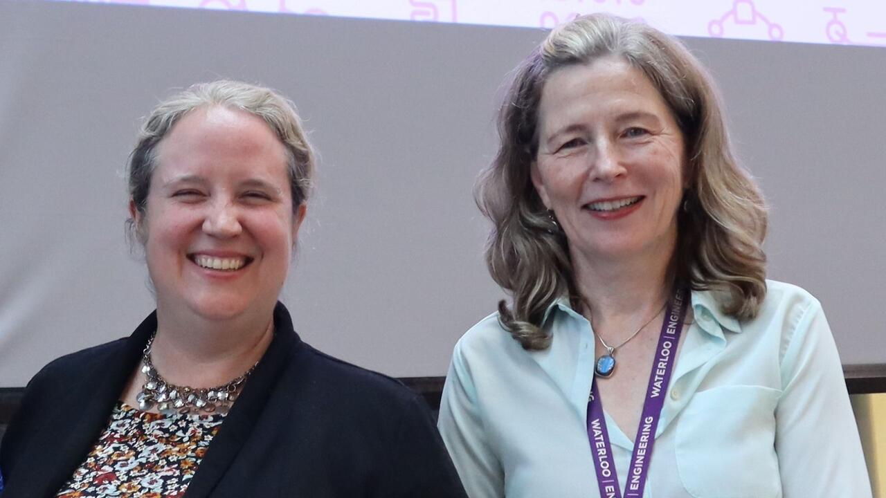 Two women smiling