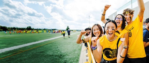 Students cheering on Black and Gold Day