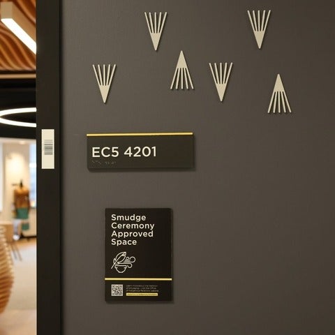 smudge ceremony approved space signage on a wall