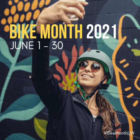 Woman taking a selfie with a bike helmet on